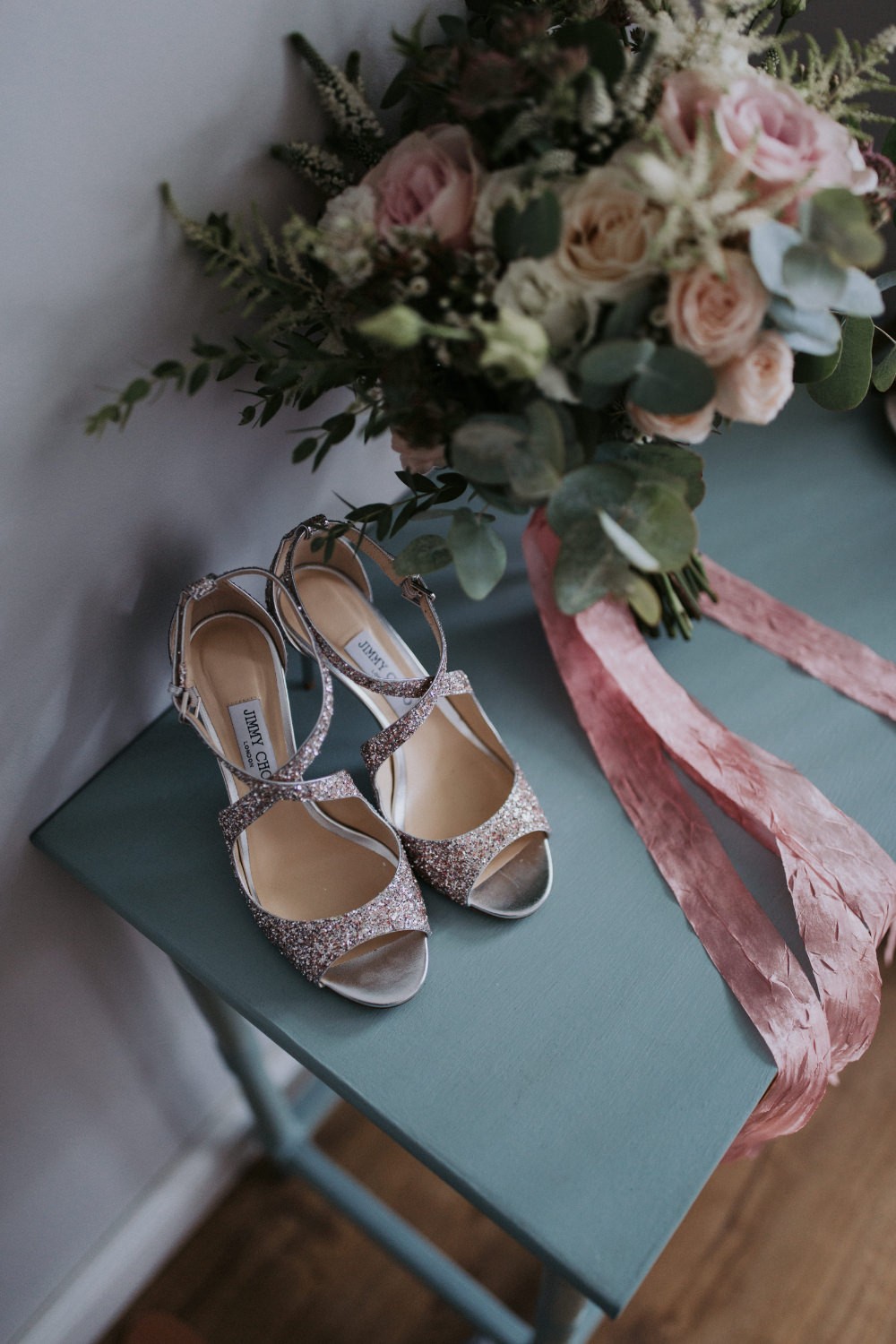 Contemporary Rose Gold Wedding with Wooden Signage