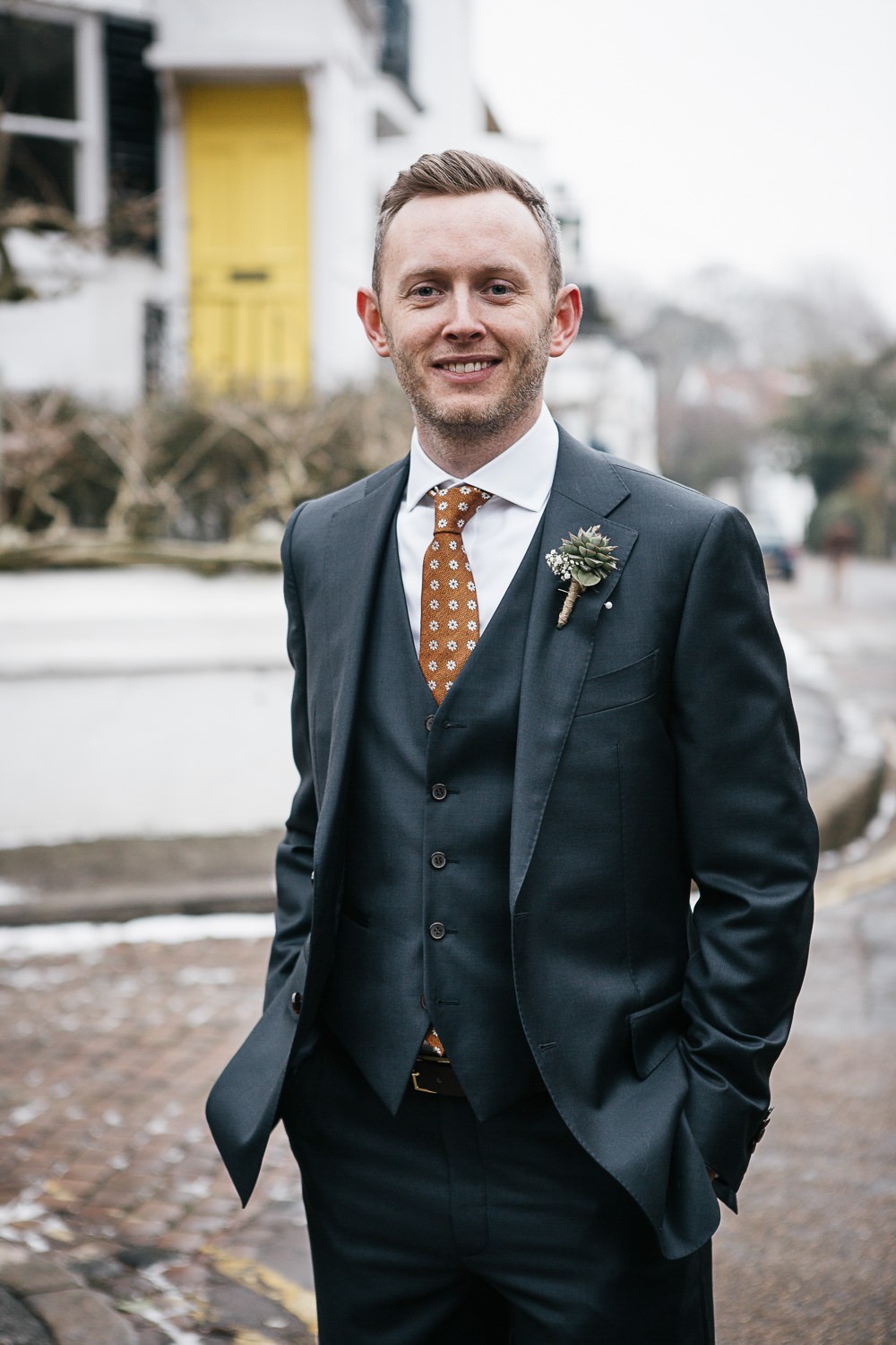 Minimalist Snowy City Wedding with a Stylish Bride in a Jumpsuit