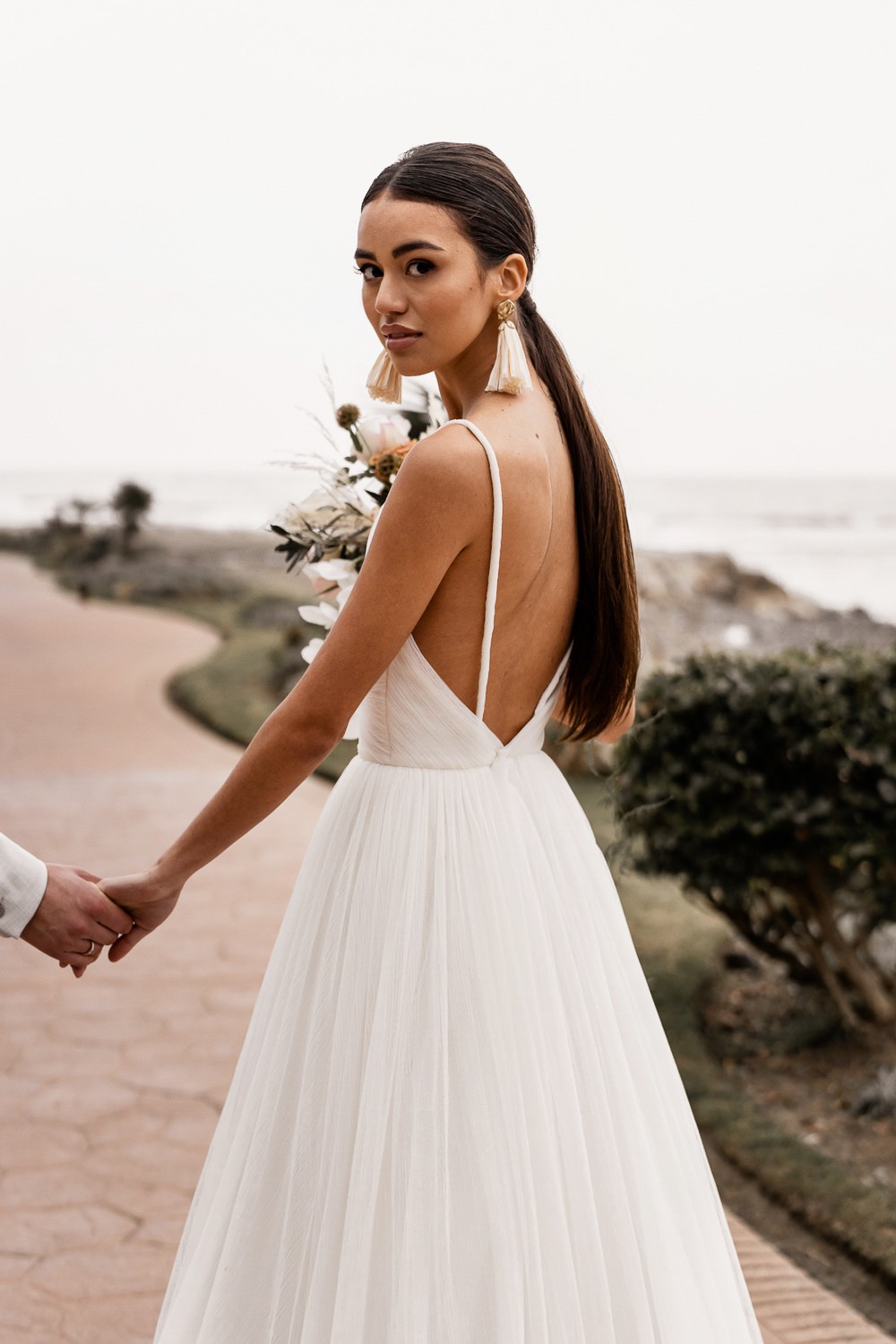 Long Hair Ponytail & Statement Earrings