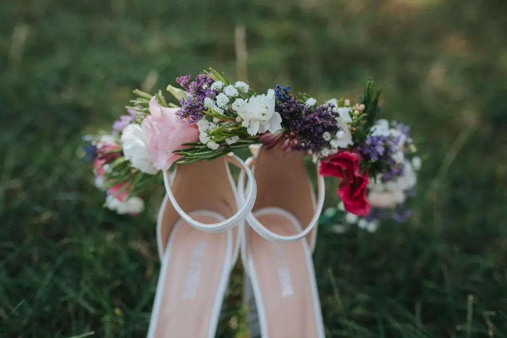 Summer Boho Outdoor Wedding with A Persian Rug Aisle & Dreamcatchers