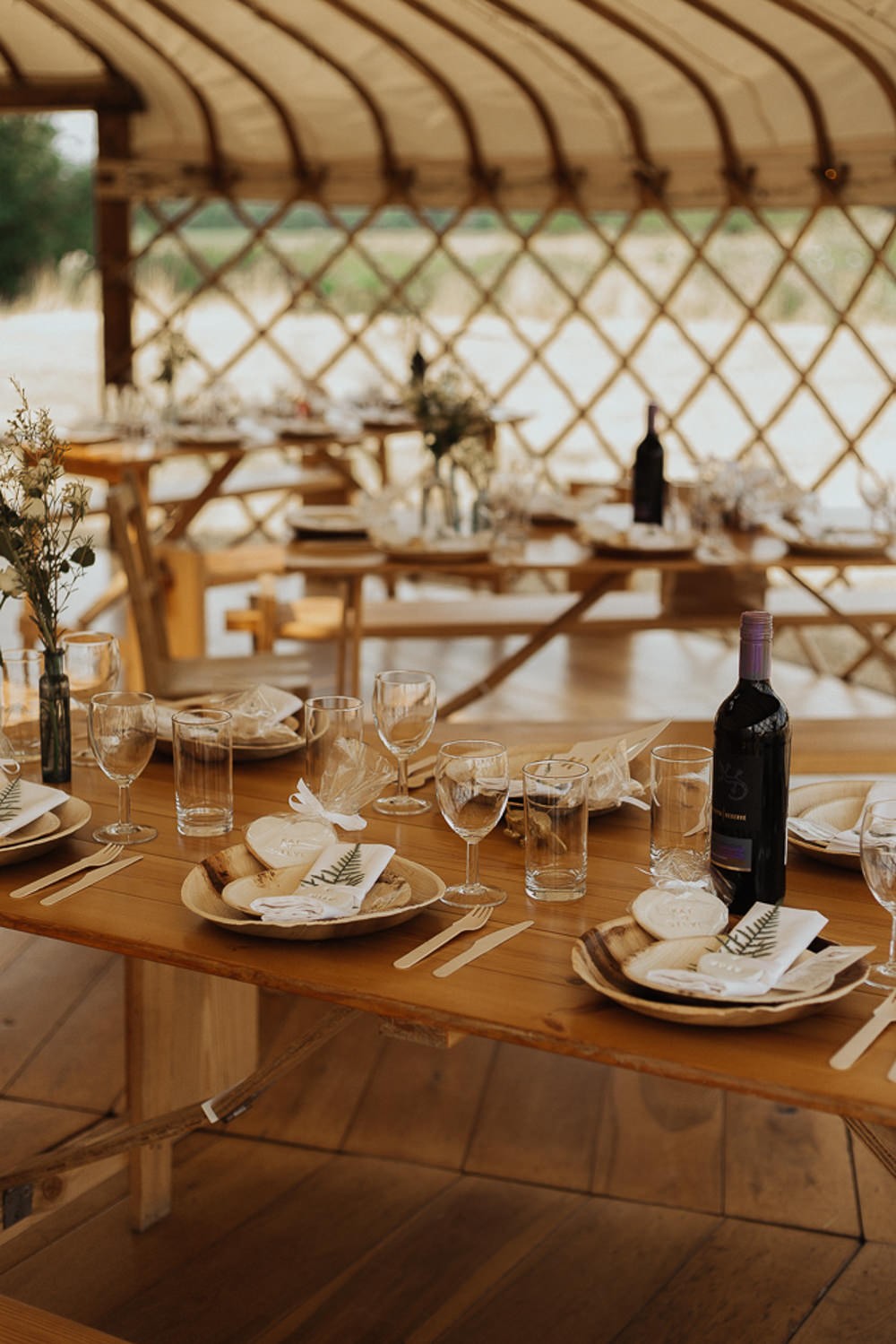 Rustic Riverside Yurt Wedding with Greenery & Wooden Signage