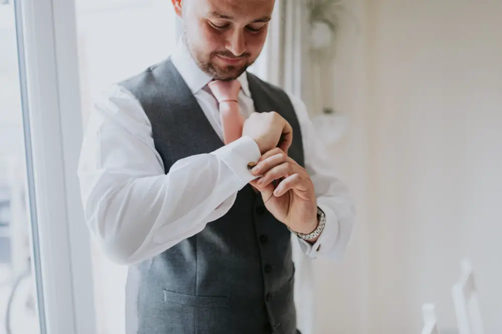 Contemporary Rose Gold Wedding with Wooden Signage